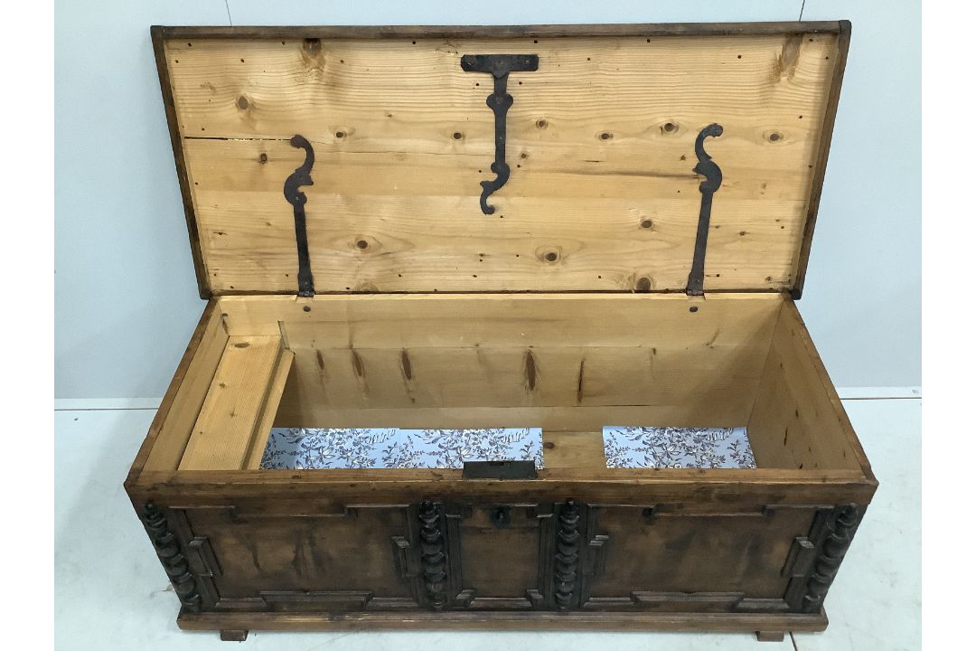 An 18th century style panelled pine coffer, width 146cm, depth 63cm, height 54cm***CONDITION - Image 3 of 3