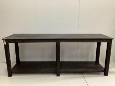 A stained pine rectangular draper's table, width 240cm, depth 67cm, height 92cm***CONDITION