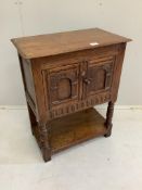 A small 18th century style oak side cabinet, width 60cm, depth 34cm, height 76cm***CONDITION