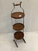 An oak and steel folding cake stand, height 92cm***CONDITION REPORT***PLEASE NOTE:- Prospective