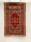An antique hand knotted Caucasian blue ground prayer rug, 180 x 117cm***CONDITION REPORT***PLEASE