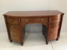 A George IV mahogany bow front sideboard, width 168cm, depth 68cm, height 94cm***CONDITION