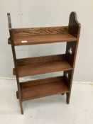 An Arts & Crafts oak open bookcase, width 58cm, depth 19cm, height 97cm***CONDITION REPORT***