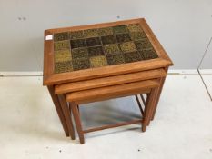 Trioh, a nest of three mid century Danish teak tile top tea tables, width 56cm, depth 41cm, height