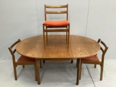 A mid century Meredew circular teak extending dining table, diameter 116cm, height 71cm and three
