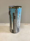 A Fornasetti Grattacieli stickstand, diameter 26cm, height 57cm