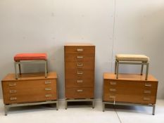 A mid century G Plan Limba teak five piece bedroom suite comprising tall chest, a pair of low chests
