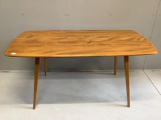 An Ercol rectangular elm dining table, width 150cm, depth 75cm, height 71cm together with six