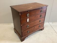 A small early 19th century four drawer mahogany chest with brushing slide, width 83cm, depth 47cm,