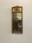 A French brass pier glass, width 23cm, height 57cm. Condition - fair