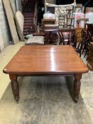 A late Victorian oak extending dining table, with three spare leaves, width 290cm extended, depth