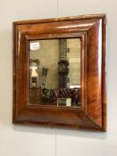 A walnut veneered cushion-framed wall mirror, in the William & Mary style, width 45cm, height