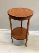 An Edwardian circular satinwood two tier occasional table, diameter 38cm, height 70cm. Condition -