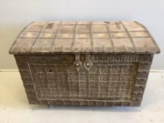 An Indian iron bound domed hardwood trunk, width 104cm, depth 62cm, height 71cm. Condition - poor