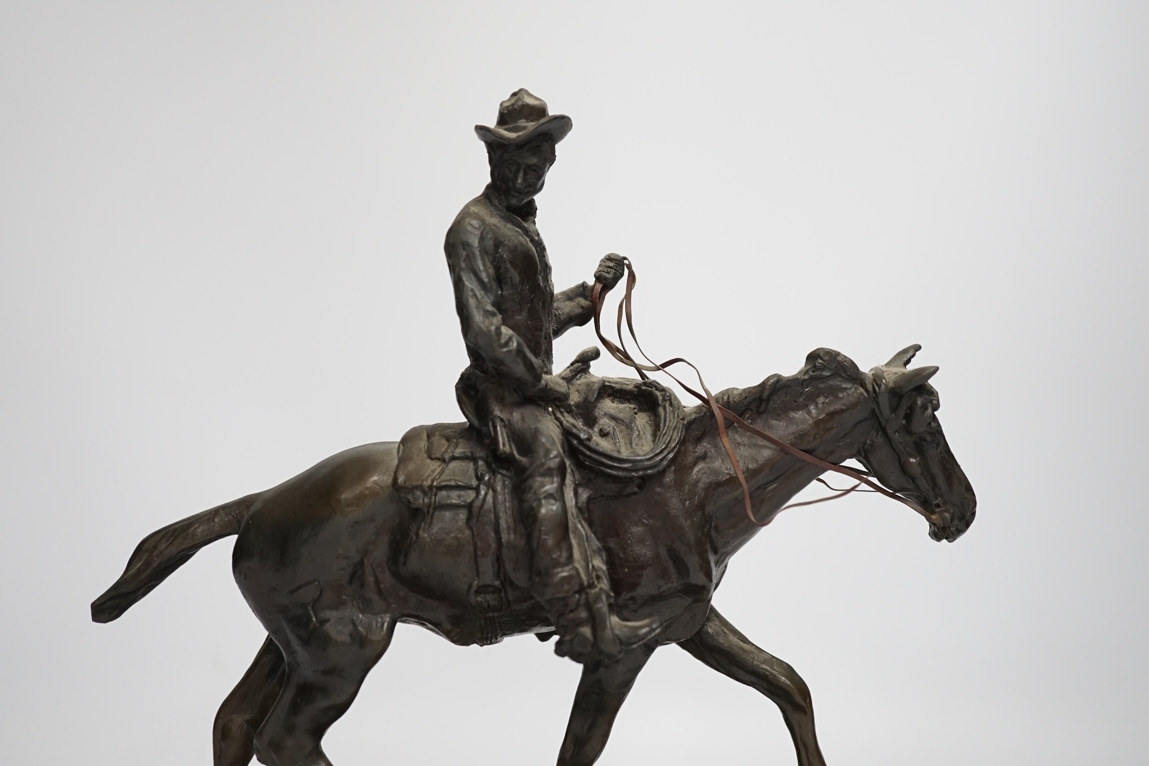 After Charles Marian Russell, a bronze group of Will Rogers, 29cm high - Image 13 of 14