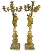 After Pierre-Philippe Thomire (1751-1843), a pair of Regency French Empire five light candelabra