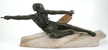 Max Le Verriere, (1891-1973), a French Art Deco bronzed spelter figure, 'L'Embuscade' crouching upon