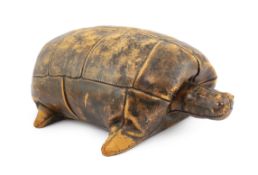 Omersa for Liberty & Co., a brown leather model of a tortoise with glass beaded eyes, 54cm long,