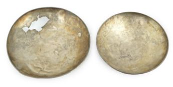 Two silver phialai, Gandhara, 1st century BC - 1st century AD, one incomplete, each a plain hammered