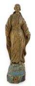 An 18th century Continental carved wood figure of a female saint, with gilt and painted
