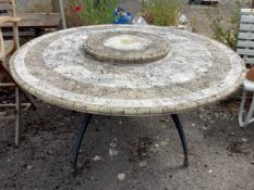 A circular mosaic stone garden table with 'Lazy Susan', diameter 150cm, height 74cm. Condition -