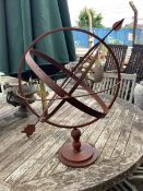 A metal armillary sphere, height 62cm. Condition - fair