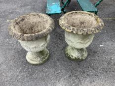 A pair of circular reconstituted stone garden planters, diameter 49cm, height 54cm. Condition -
