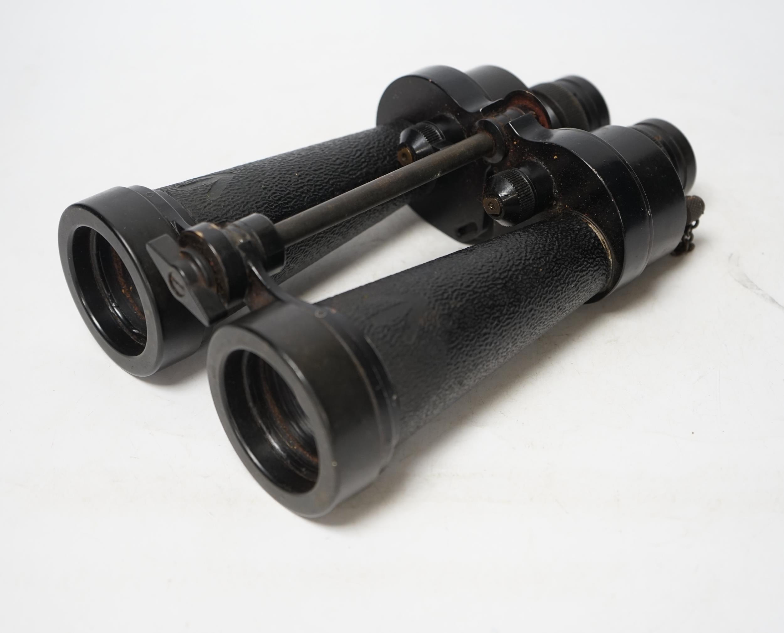 A pair of brown leather cased WWII Naval binoculars, Barr & Stroud, binoculars 24cm long,