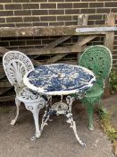 A Victorian style painted aluminium circular garden table, diameter 68cm, height 70cm and two
