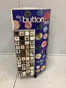 A Coats 'button box’ haberdasher's button display carousel, with a quantity of assorted buttons,