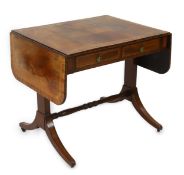 A Regency satinwood banded mahogany sofa table, with two frieze drawers on end standards with turned