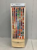 A ‘Coats Duet’ haberdasher's shop thread display unit with a quantity of assorted spools, width