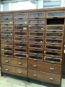 A large mid century mahogany haberdasher's cabinet, width 183cm, depth 50cm, height 199cm. Condition