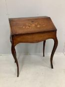 A Louis XV style floral marquetry inlaid bureau de dame, width 65cm, depth 43cm, height 89cm.