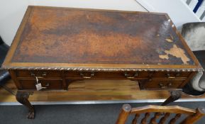 An early 20th century Chippendale Revival mahogany kneehole writing table, width 136cm, depth