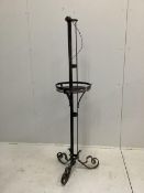 An early 20th century French wrought iron medieval style standard lamp, height 160cm. Condition -