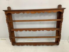 A small early 20th century mahogany plate rack, width 104cm, height 82cm. Condition - fair
