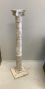 An 18th century style carved, painted pedestal, height 132cm. Condition - fair