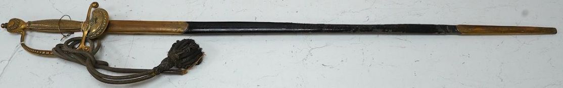 A late Victorian court sword gilt brass hilt with crown on guard, beaded edges, bullion dress knots,