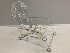 A vintage French wrought iron garden chair, width 48cm, depth 74cm, height 76cm. Condition - fair