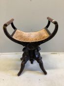 A Victorian carved mahogany adjustable music stool, width 53cm, depth 35cm, height 66cm. Condition -