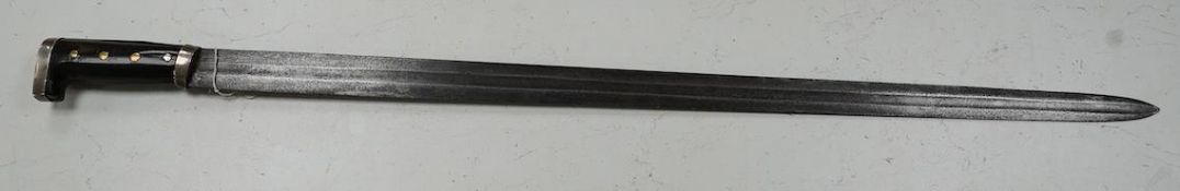 A Mexican sword machete, broad blade cut with a single fuller, with silver mounted horn hilt,