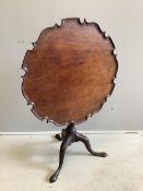 A George III circular mahogany tilt top tea table, diameter 70cm, height 68cm. Condition - fair