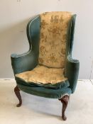 A 19th century Queen Anne style upholstered wing armchair, width 82cm, depth 60cm, height 116cm.