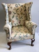 A George I style upholstered wing back armchair, width 79cm, depth 70cm, height 120cm. Condition -