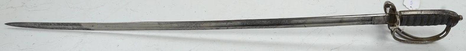A Victorian Royal Artillery officer’s sword, regulation etched blade, regulation plated hilt,