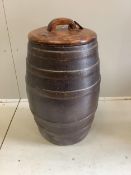A Victorian salt glazed earthenware barrel with associated wood cover, diameter 40cm, height 73cm.