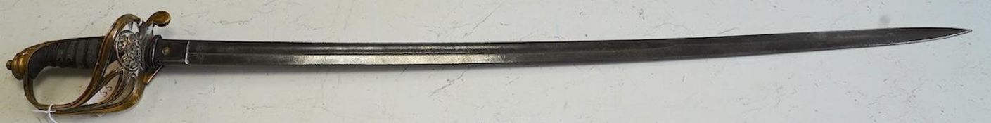 An 1845 infantry officer’s sword, with engraved, fullered and proofed blade, brass guard and remains