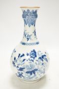 A 18th century Chinese blue and white bottle vase (guglet), 25cm. Condition - good