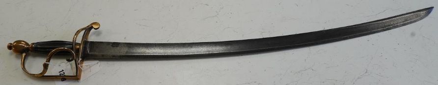 An English officer’s hanger, c.1800. brass grip with scrolling side bar, fluted ebony grip, blade